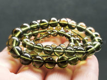 Load image into Gallery viewer, Moldavite EO++ 4.8-7.8mm 19in 111.0ct