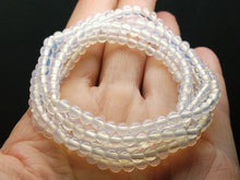 Load image into Gallery viewer, Opalesence  Andara Crystal Infinity Necklace