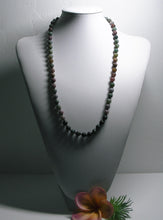 Load image into Gallery viewer, a baseball glove with a ball inside of it