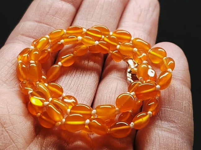 Carnelian E+ 4.5x5mm-5.5x7.5mm oval 18.25inch