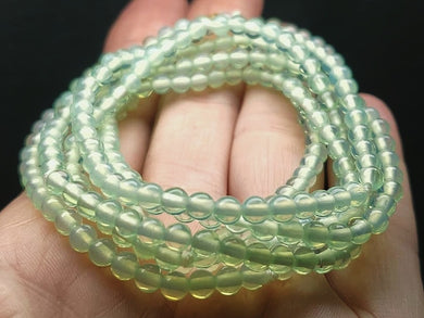 Opalesence - Green Andara Crystal Infinity Necklace