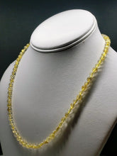 Load image into Gallery viewer, Quartz - Rutilated EO++ 5.5-6.5mm 19inch