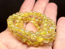 Load image into Gallery viewer, Quartz - Rutilated EO++ 5.5-6.5mm 19inch