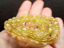Load image into Gallery viewer, Quartz - Rutilated EO++ 6.5-7mm 19.5inch