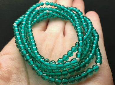 Teal Andara Crystal Infinity Necklace