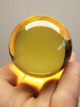 Load image into Gallery viewer, Yellow  Andara Crystal Sphere 2 inch