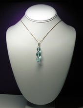 Load image into Gallery viewer, Aqua - Blue Andara Crystal with Gold Pendant (2 x 10mm &amp; 1 x 12mm)