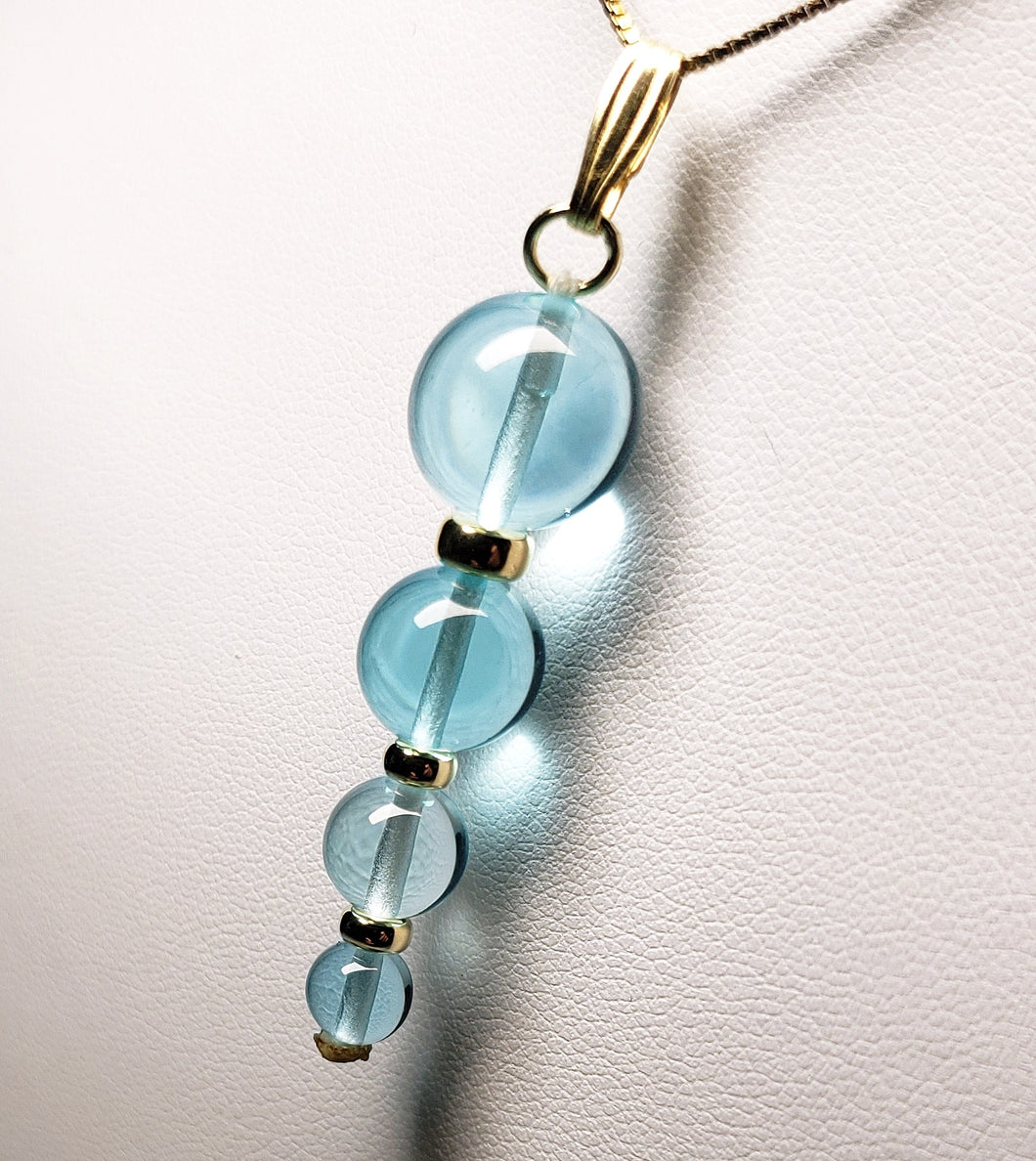 Aqua - Blue Andara Crystal with Gold Pendant (1 x 6-12mm)