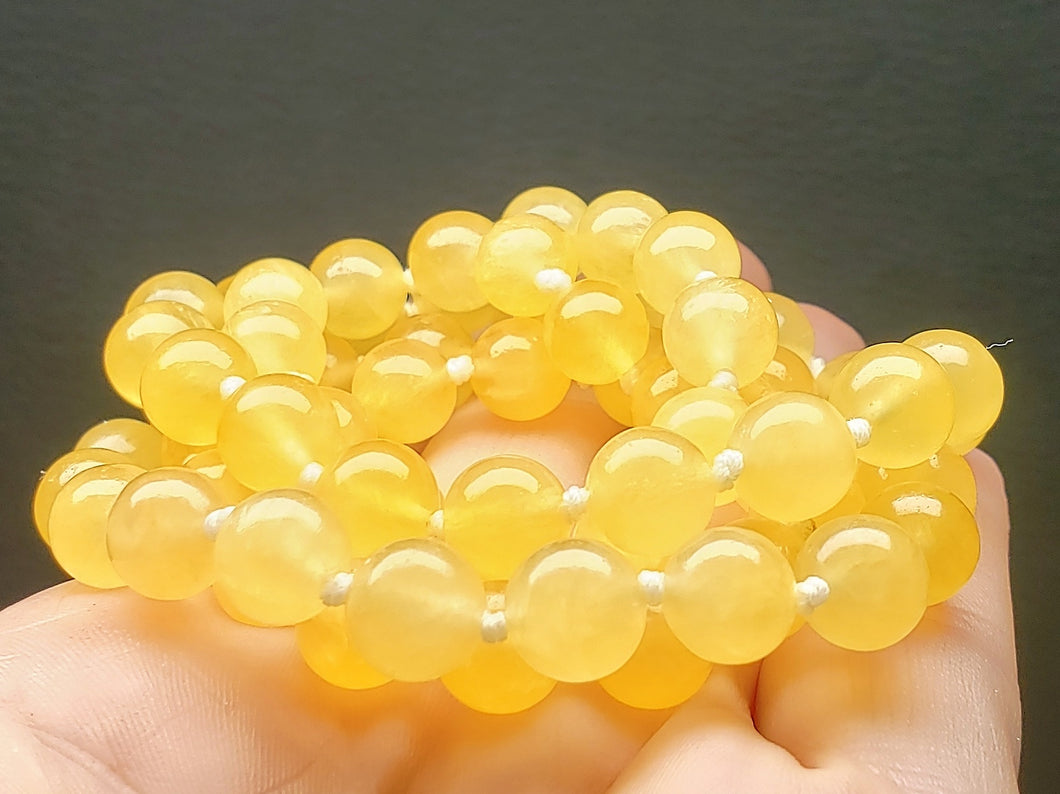 Calcite - Orange (deeper yellow)  EO+ 8+mm 23.75inch